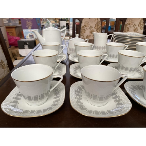 216 - Wanel 40-Piece Porcelain Tea Set