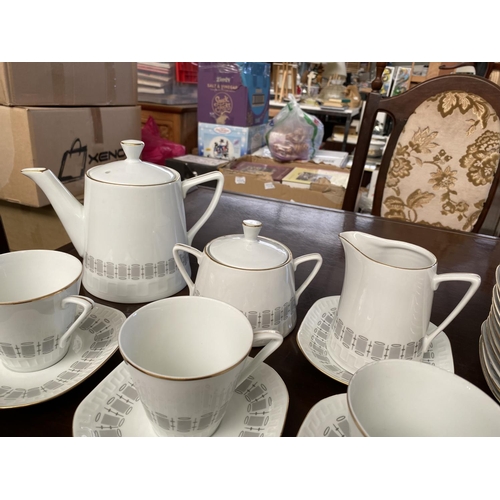 216 - Wanel 40-Piece Porcelain Tea Set