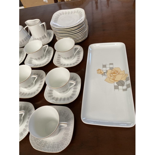 216 - Wanel 40-Piece Porcelain Tea Set