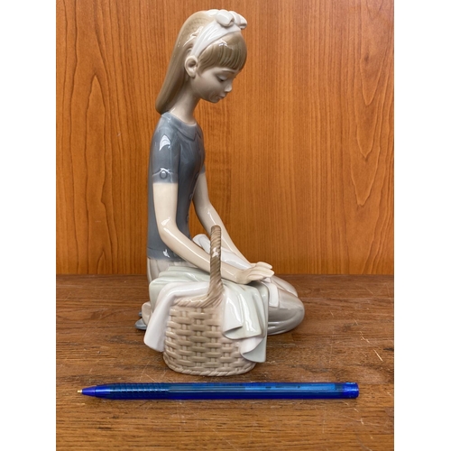 67 - Lladro Girl Sitting with Picnic Basket Feeding Dove Figurine (20cm H.)