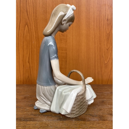 67 - Lladro Girl Sitting with Picnic Basket Feeding Dove Figurine (20cm H.)