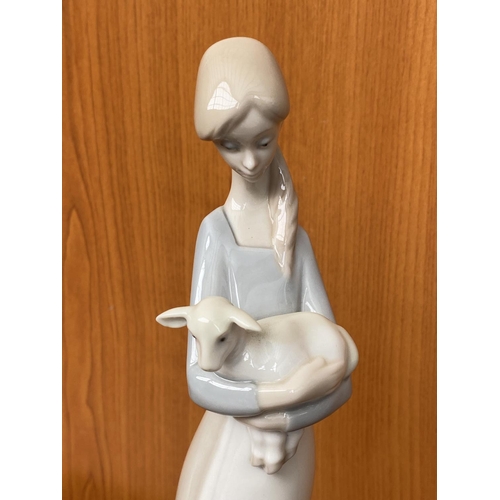 69 - Lladro Figurine Girl Holding a Lamb (26cm H.)