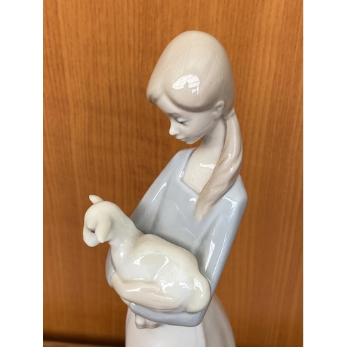 69 - Lladro Figurine Girl Holding a Lamb (26cm H.)