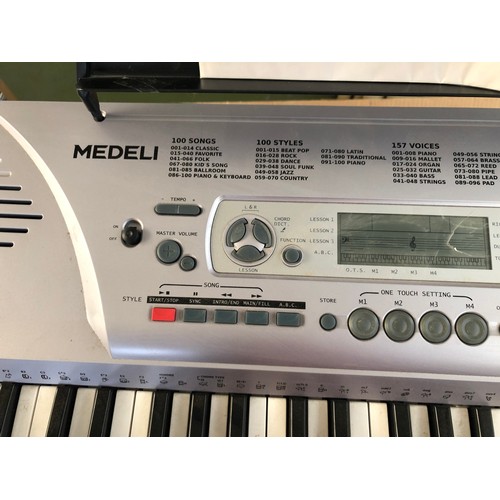 96 - Medeli M10 Electronic Keyboard with 157 Voices and 100 Melodies for Training