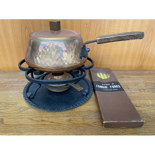 Sold at Auction: Cast iron stove with cast iron coffee pot