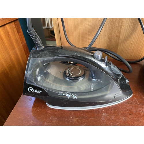 90 - Oster Coffee Maker and Steam Iron - Code 'Welcome Kit'