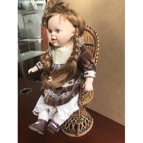 217 - Vintage Large Ceramic Doll on Wicker Chair