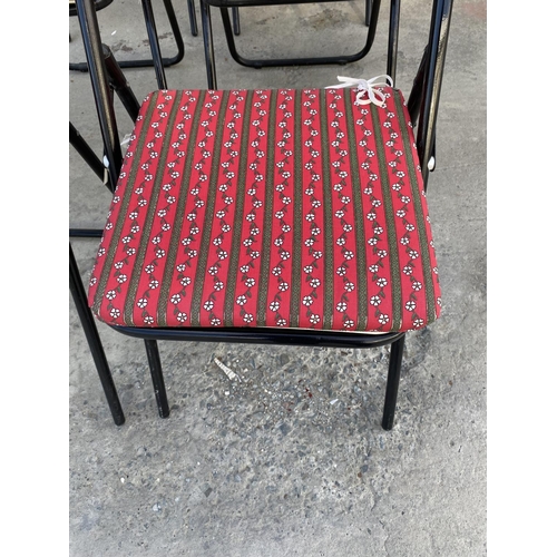 126 - Set of 6 Metal Chairs with Plastic Rattan Seats Together with 6 Red Square Cushions