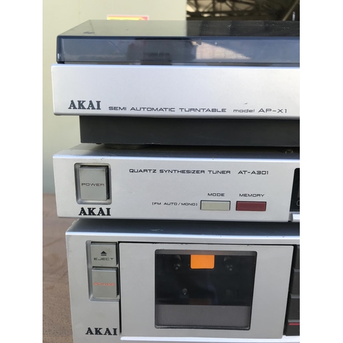 51 - Akai AM-A201 Stereo Integrated Amplifier, Stereo Cassette Deck HX-A101, Quartz Synthesizer Tuner AT-... 