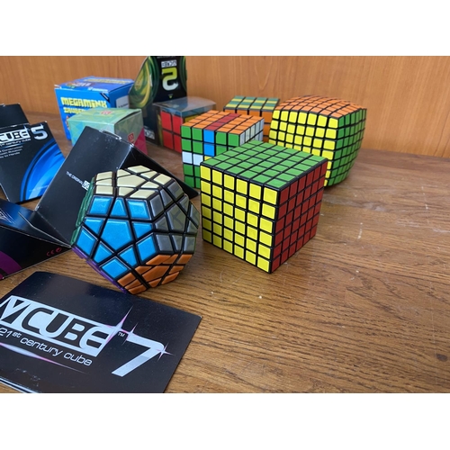 149 - Collection of 8 Rubik V Cubes