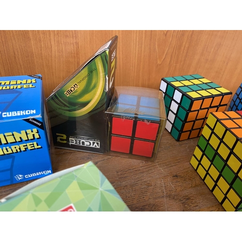 149 - Collection of 8 Rubik V Cubes