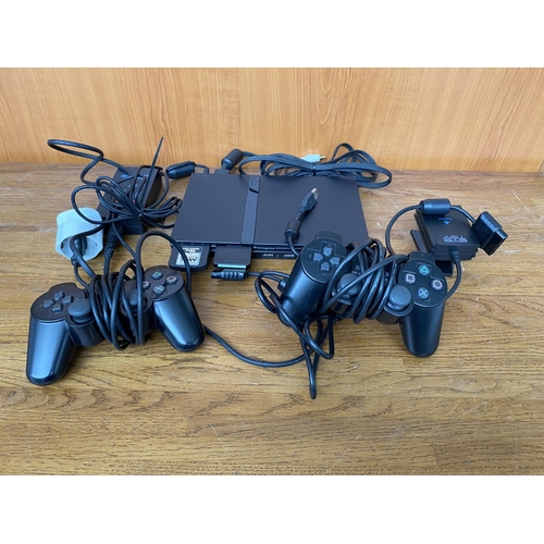 150 - Sony Playstation 2 Slim Console with x2 Wired Game Controller Game Pads, Eye Toy Camera and Game, x4... 