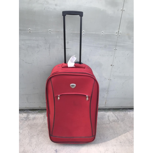 468 - IT International Traveler Lightweight Red Luggage Suitcase on Wheels