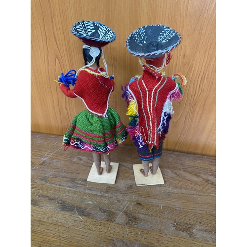 550 - Pair of Peruvian Dolls in National Costumes on Small Wooden Pedestal Taken Back 19/1/24