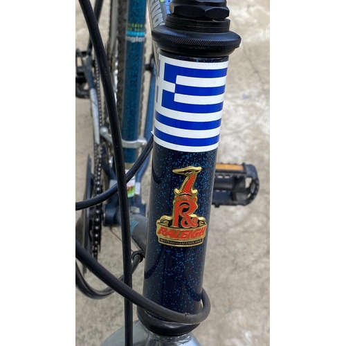 80 - Raleigh Activator 21-Speed Men's Mountain Bicycle (Tires Need Attention)