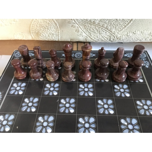 181 - Chess Board with Onyx Pieces