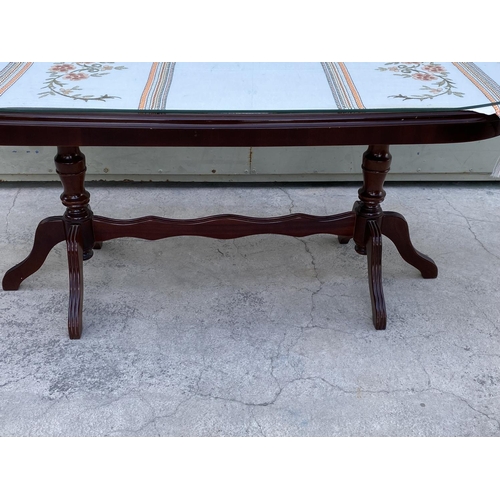 141 - Oval Coffee Table with Glass Protector Top and Underglass Embroidered Cloth (117 W. x 48 D. x 50cm H... 