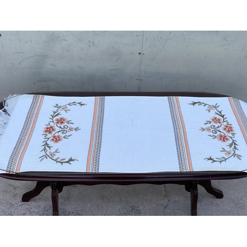 141 - Oval Coffee Table with Glass Protector Top and Underglass Embroidered Cloth (117 W. x 48 D. x 50cm H... 