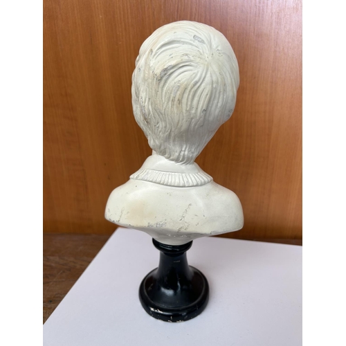 165 - Carved Ceramic Bust of a Boy on Wooden Stand (26cm H.)