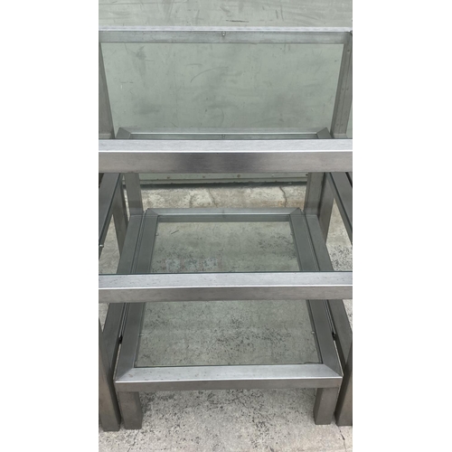 85 - Commercial Heavy Duty Nesting Tables in Brushed Aluminium and Glass (75 W. x 70 D. x 80cm H. Largest... 