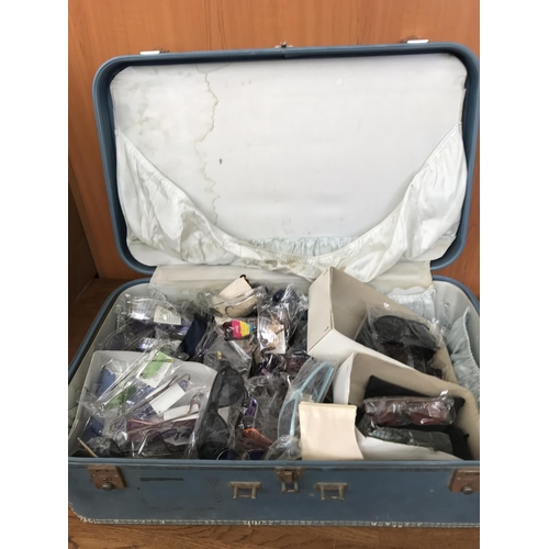 55 - Vintage Suitcase with More Than 30 Pairs of Sunglasses