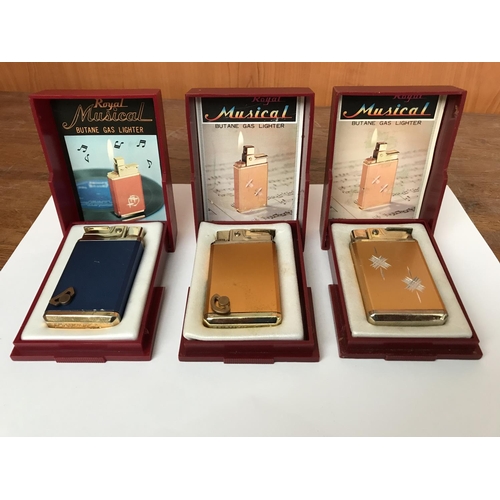 57 - x3 Vintage Royal Musical Lighters in Boxes