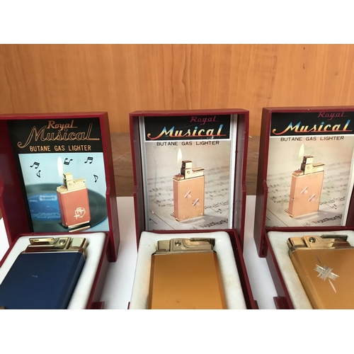 57 - x3 Vintage Royal Musical Lighters in Boxes