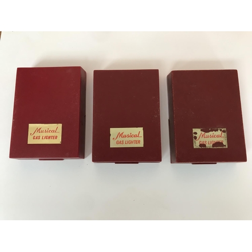 57 - x3 Vintage Royal Musical Lighters in Boxes