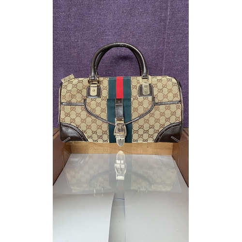 150 - Gucci Monogram Canvas Ladies Bag, Serial Number 113754/1669