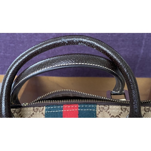 150 - Gucci Monogram Canvas Ladies Bag, Serial Number 113754/1669