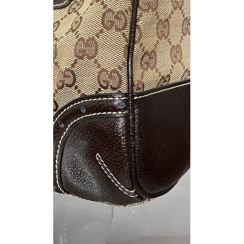 150 - Gucci Monogram Canvas Ladies Bag, Serial Number 113754/1669