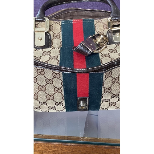 150 - Gucci Monogram Canvas Ladies Bag, Serial Number 113754/1669
