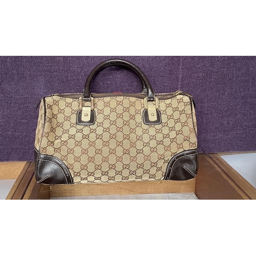 150 - Gucci Monogram Canvas Ladies Bag, Serial Number 113754/1669