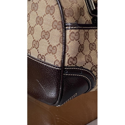 150 - Gucci Monogram Canvas Ladies Bag, Serial Number 113754/1669