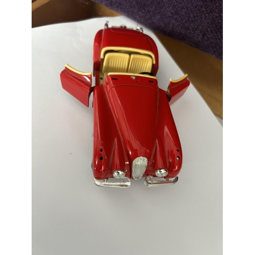 95 - x3 Vintage Toys, Burago Jaguar XK 120 1948 Model Car on Scale 1:24, Time Shock Game and Stereo-Rama ... 