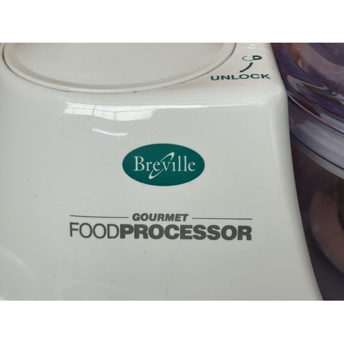 74 - Breville Gourmet Food Processor and Blender with Attachments (Small Chip as in Photo)