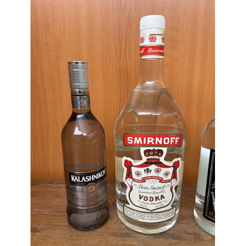 15 - x4 Bottles of Vodka, Smirnoff 40% 200Cl, Stolichnaya 1L, Russian Kalashnikov 0.7Cl and Legionary 1L