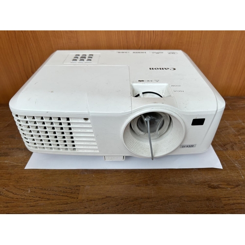 246 - Canon Projector LV-X320