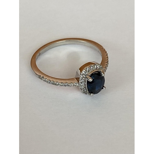 45 - White Gold 18ct Diamond & Sapphire Cluster Ring (0.82 Natural Sapphire, 0.16 GSI, 18ct Gold)