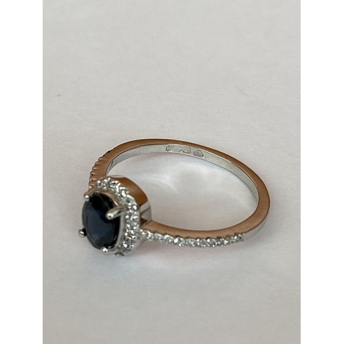 45 - White Gold 18ct Diamond & Sapphire Cluster Ring (0.82 Natural Sapphire, 0.16 GSI, 18ct Gold)