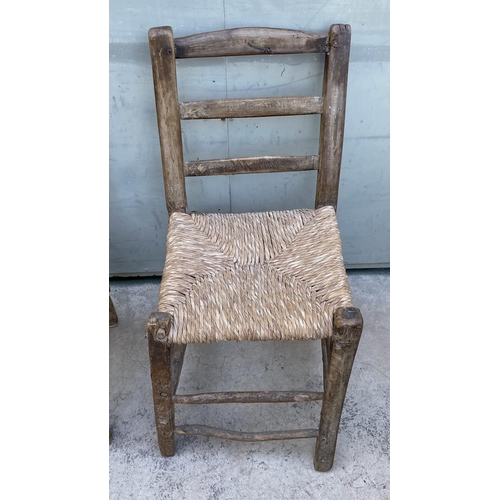 51 - x2 Vintage Traditional Hand Carved Coffee Shop Woven Chairs