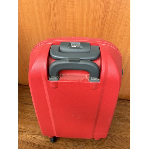 171 - Larvender Hard Shell Red Travel Bag on Wheels (33 W. x 21 D. x 52cm H.)