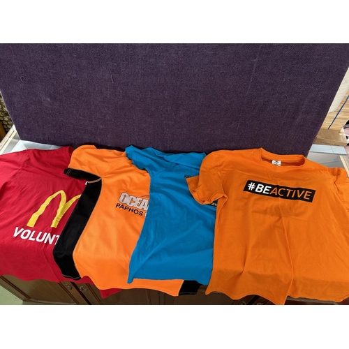 493 - Collection of 4 Jersey/T-Shirts From Various Athletic Events