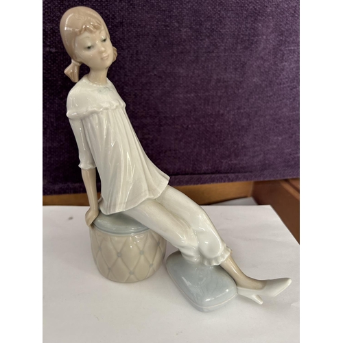 93 - Lladro Figurine of Seated Girl (19cm H.)