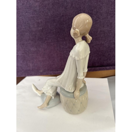 93 - Lladro Figurine of Seated Girl (19cm H.)