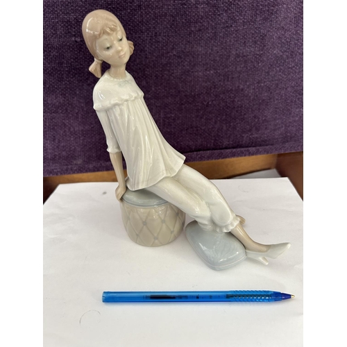 93 - Lladro Figurine of Seated Girl (19cm H.)