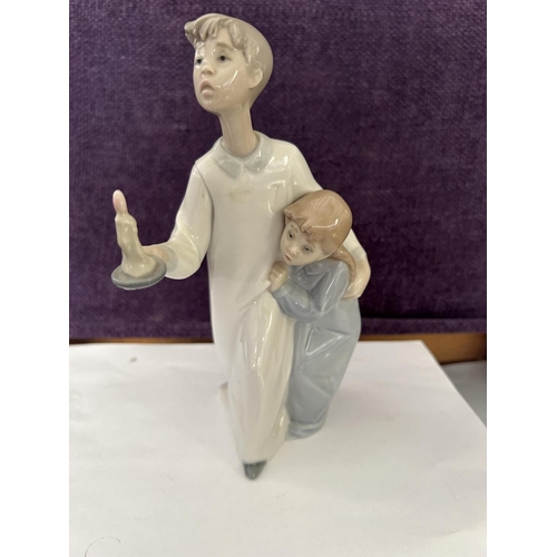 94 - Lladro Figurine of Boy and Girl (21cm H.)