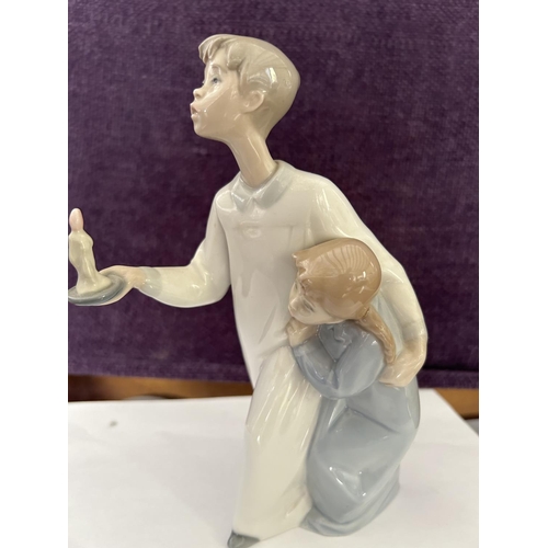 94 - Lladro Figurine of Boy and Girl (21cm H.)