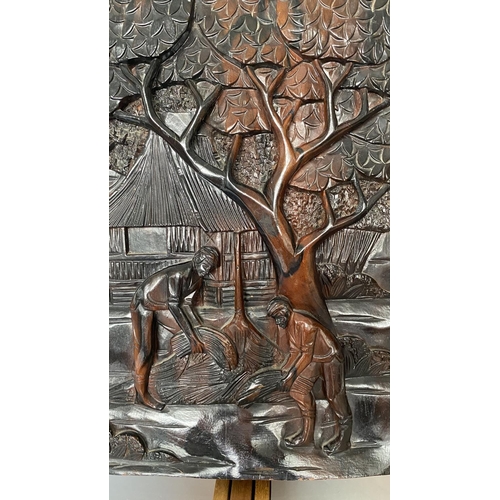 11 - Kamagong Wood Panel with Relief Carving Depicting Rural Scene (29 x 41cm)