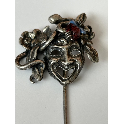 573 - Silver Mask Hatpin with Amethyst Stones